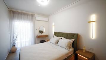 Departamento, 2 habitaciones | Insonorización, tabla de planchar con plancha y cuna de viaje