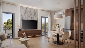 Appartamento, 2 camere da letto | Area soggiorno | Smart TV 65 pollici con canali via cavo, Netflix, servizi in streaming