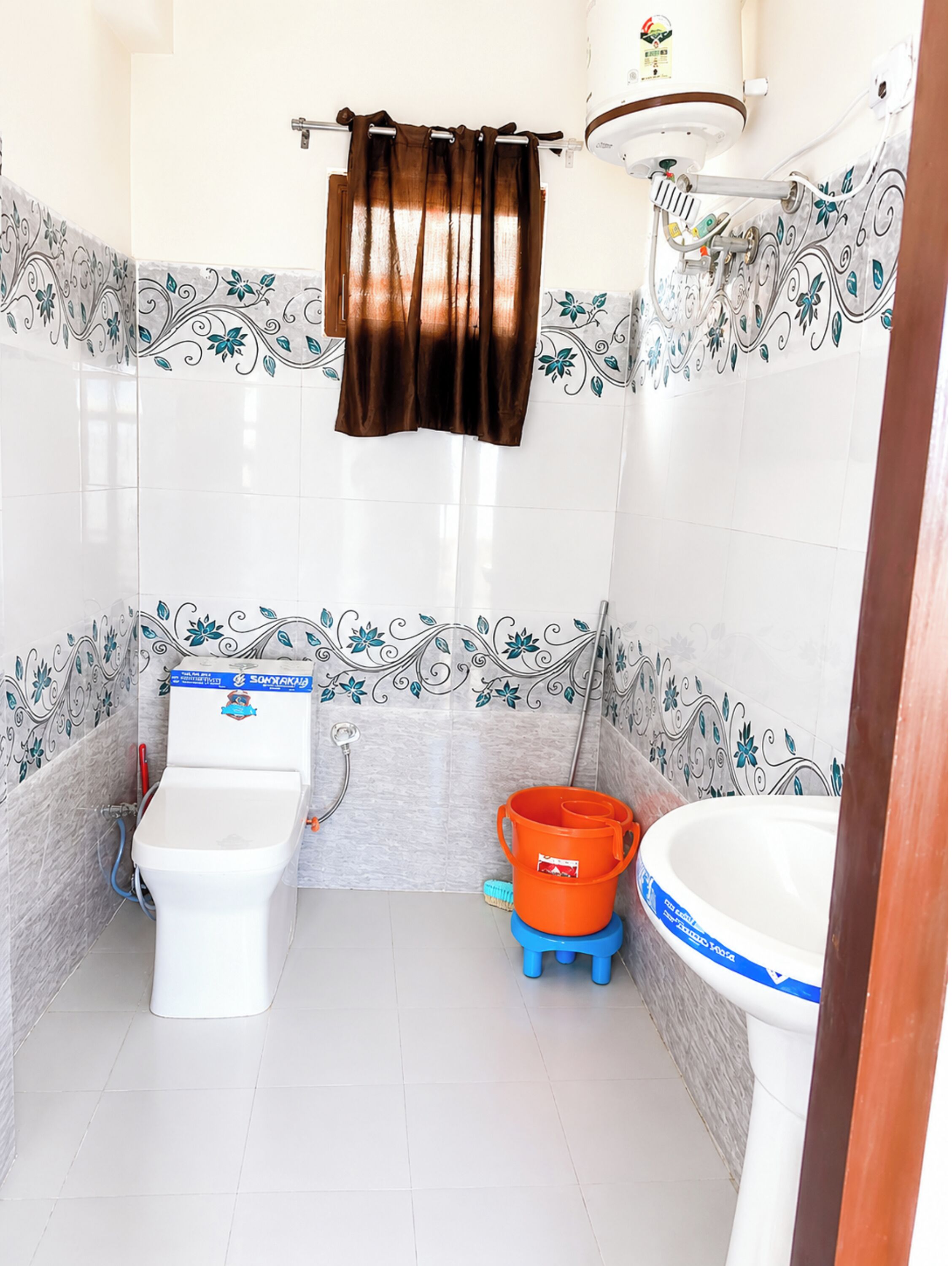 Shower, rainfall showerhead, slippers, towels