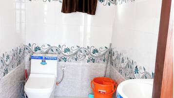 Shower, rainfall showerhead, slippers, towels