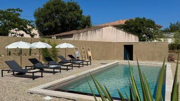 Habitación doble Deluxe, vista al jardín | Alberca