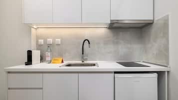 Apartment, 1 Bedroom | Private kitchenette | Coffee/tea maker, mini-fridge, stovetop, cookware/dishes/utensils