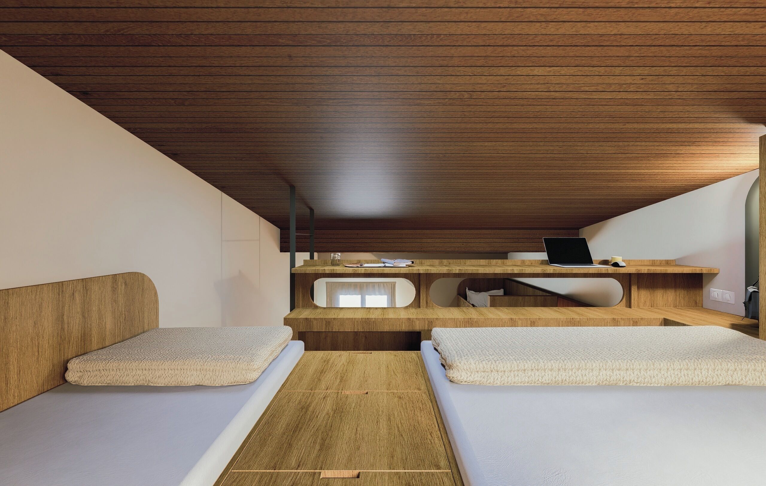 A compact room with two beds, a desk, and a small kitchenette.