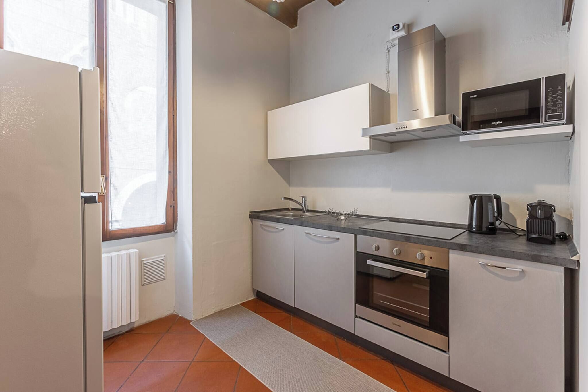 Coffee/tea maker, fridge, microwave, oven