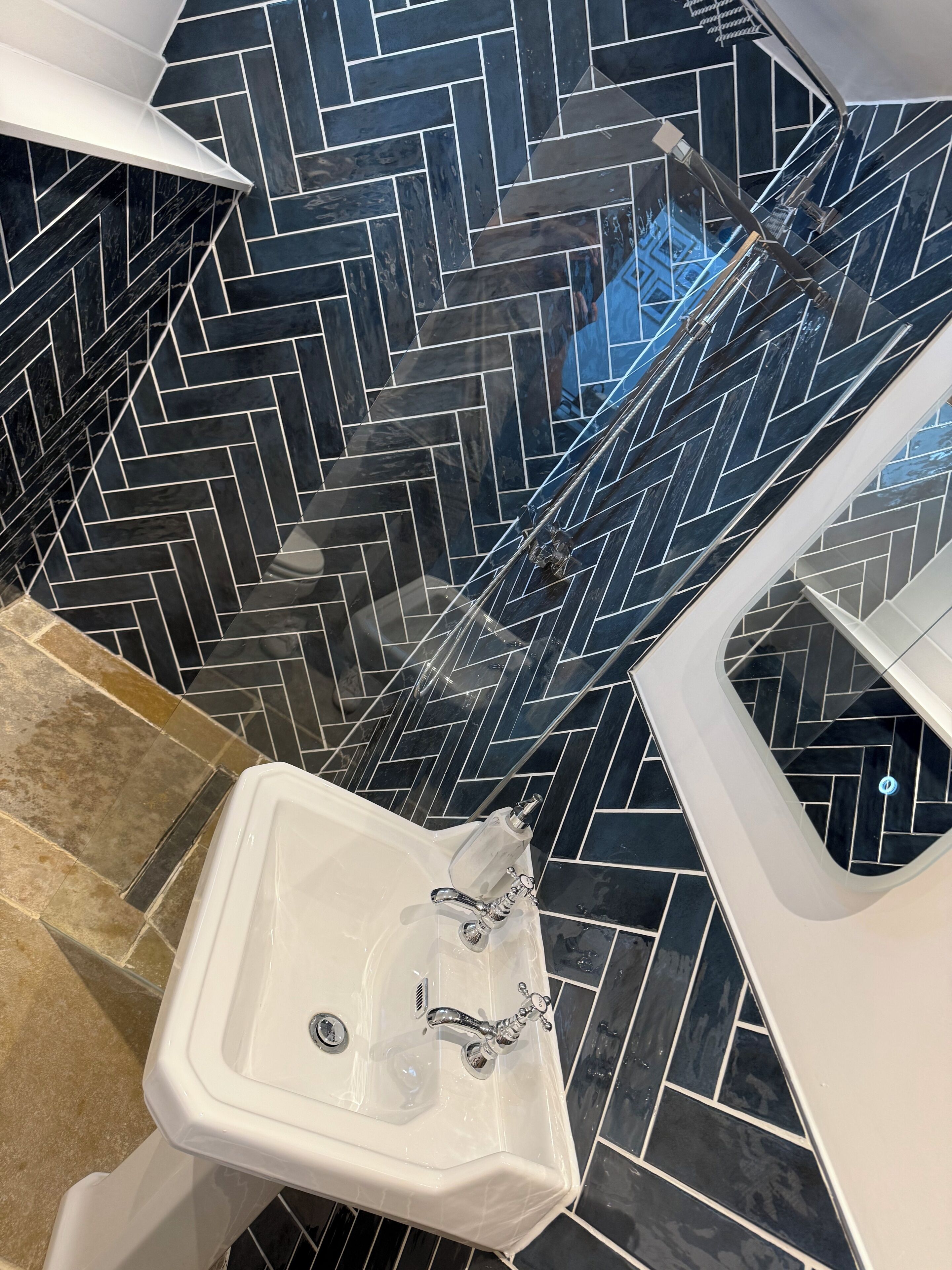 Shower, hair dryer, towels, toilet paper