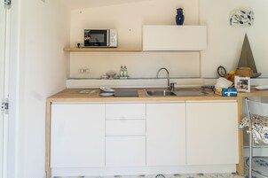 Apartamento, patio | Cocina privada
