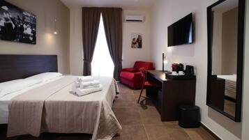 Deluxe Triple Room, Balcony, City View | In-room safe, blackout curtains, soundproofing