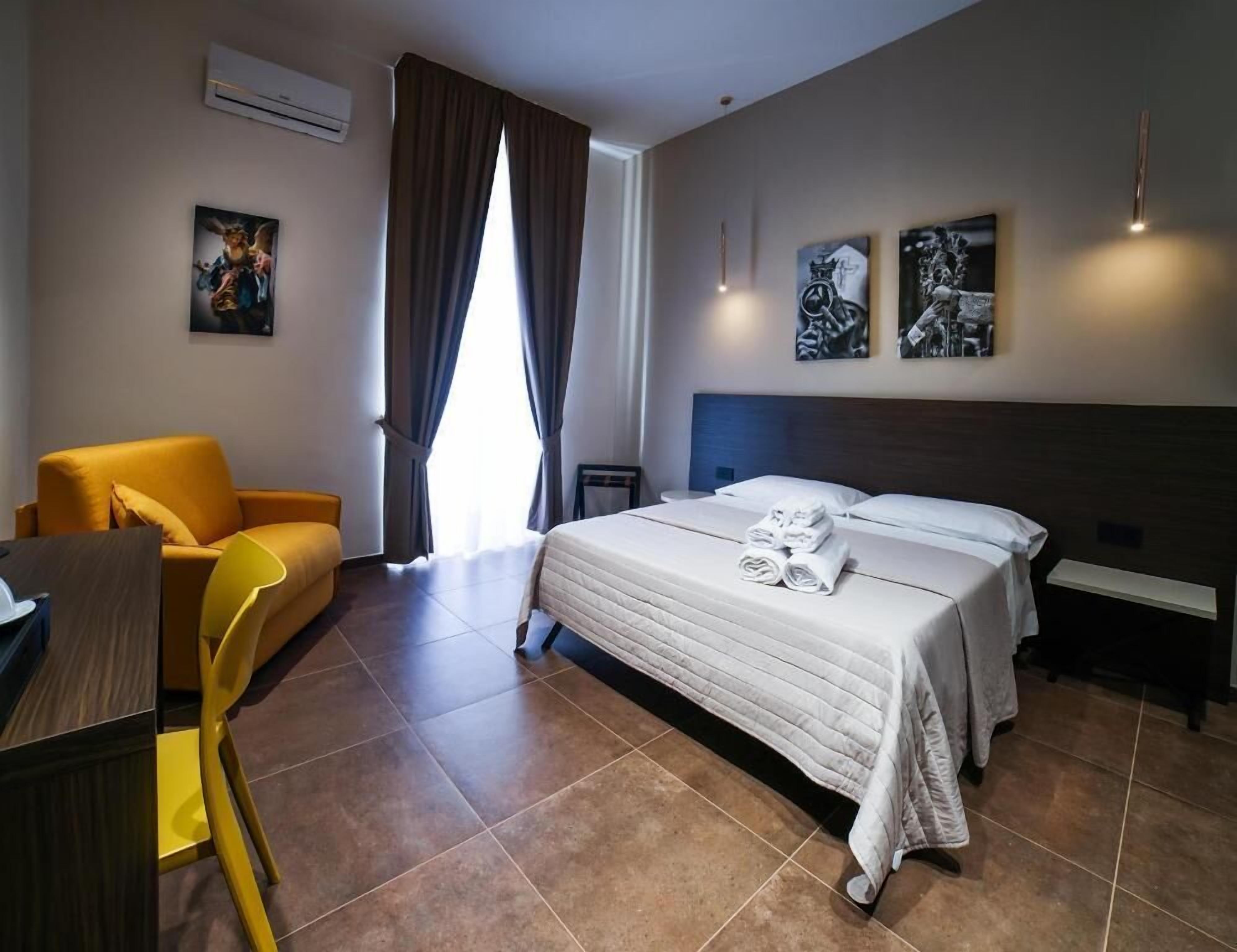 Deluxe Triple Room, Balcony, City View | In-room safe, blackout curtains, soundproofing