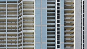 A multi-story hotel with a central tower and two side wings. - Beachfront Bliss with Gulf Views and Resort Pools (Panama City Beach)