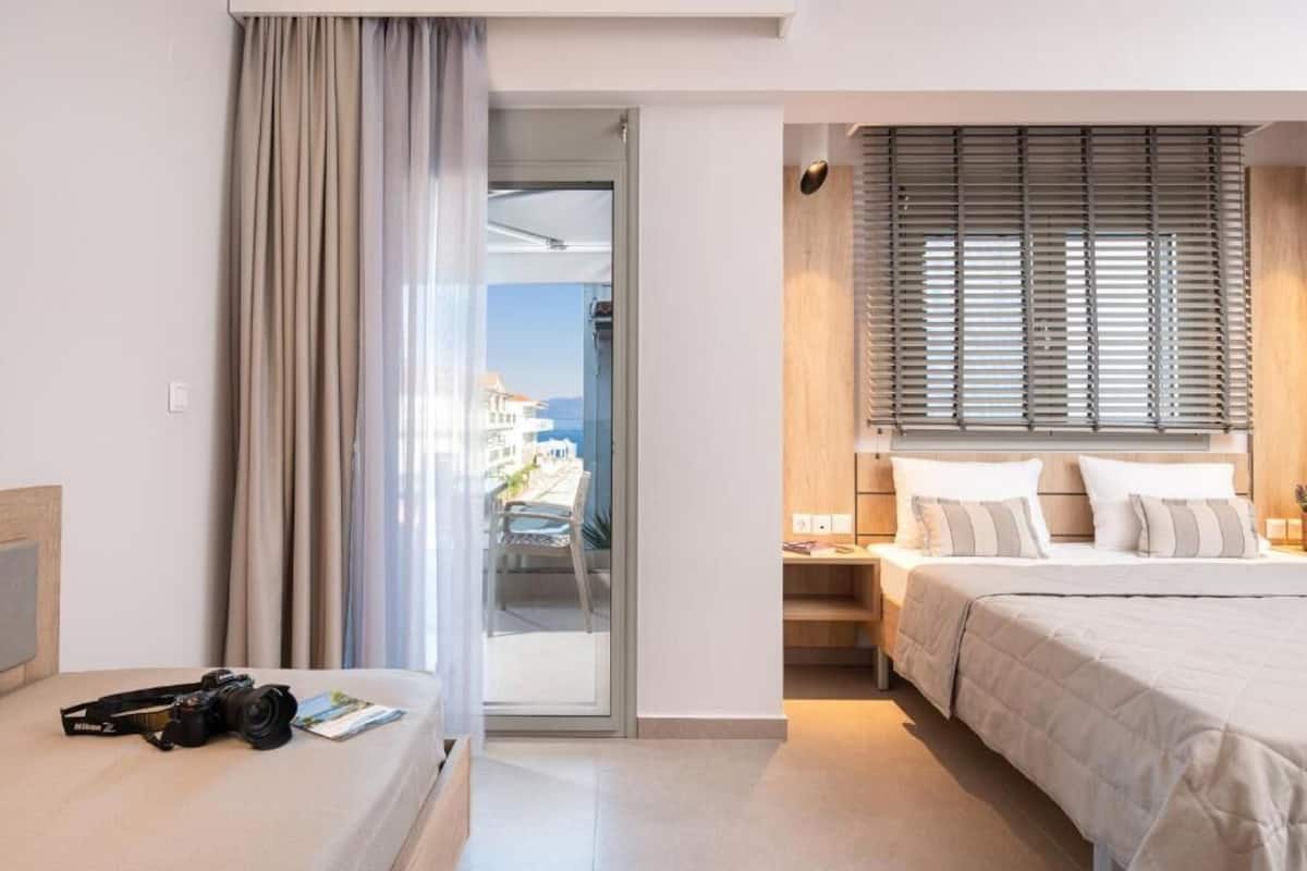 Deluxe Studio Suite, Balcony, Partial Sea View | In-room safe, blackout drapes, soundproofing