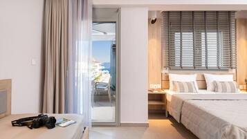 Deluxe Studio Suite, Balcony, Partial Sea View | In-room safe, blackout curtains, soundproofing