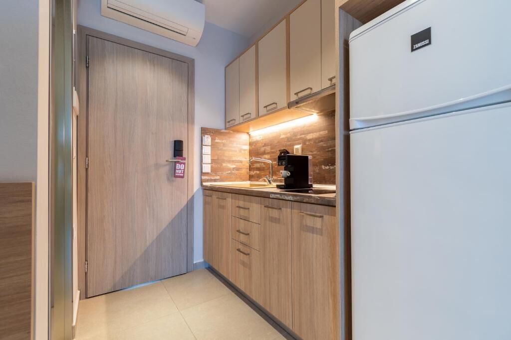 Exclusive Suite, Balcony, Partial Sea View | Private kitchen | Mini-fridge, stovetop, cookware/dishes/utensils, freezer