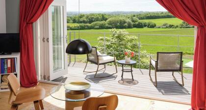 Outstanding contemporary country house, close to Bath with stunning views.
