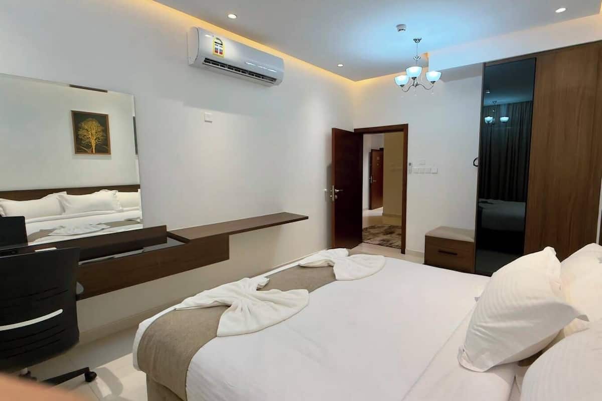 Premium bedding, desk, laptop workspace, iron/ironing board (on request)