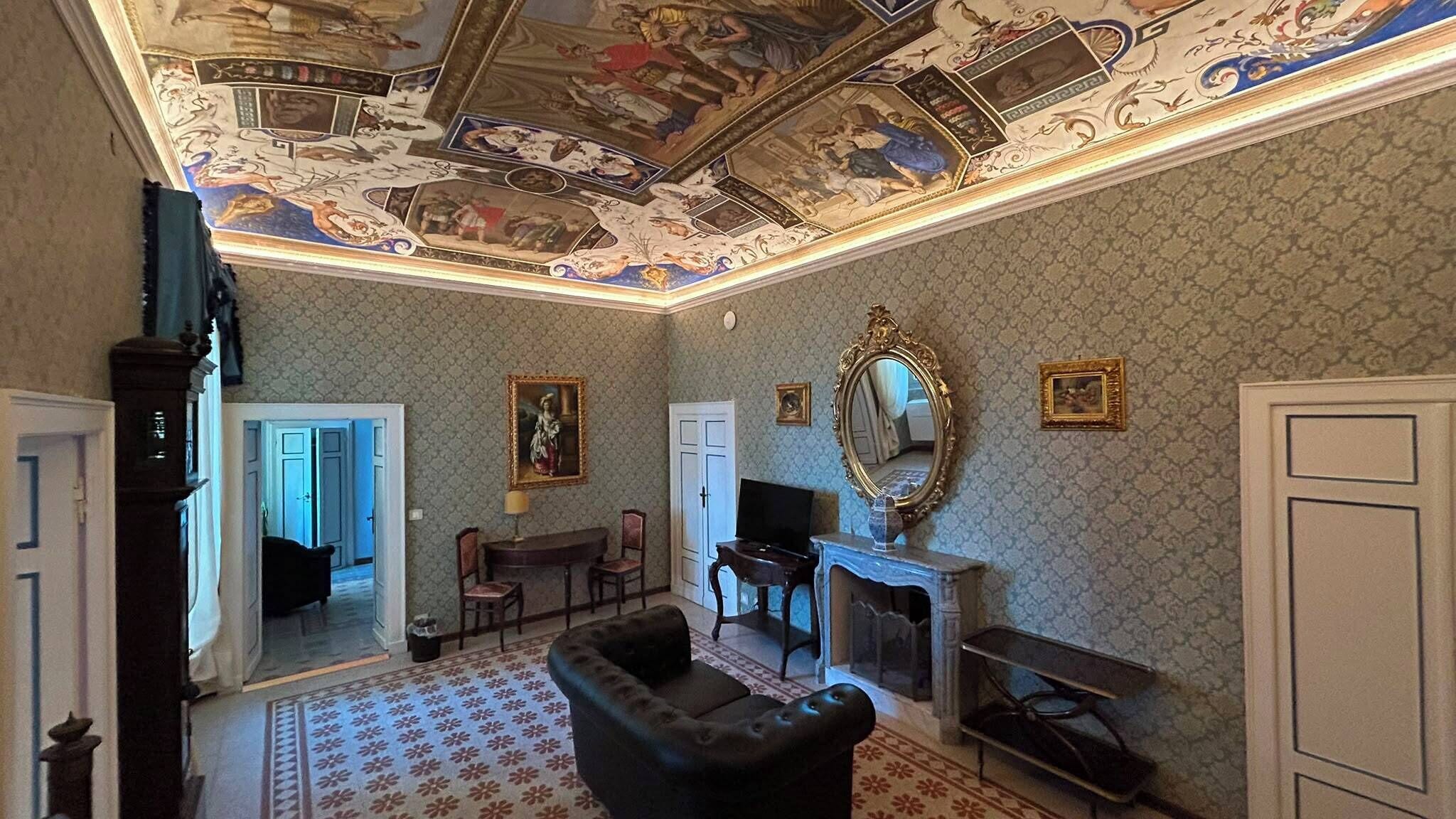 Suite presidencial, vista al lago | Área de sala de estar