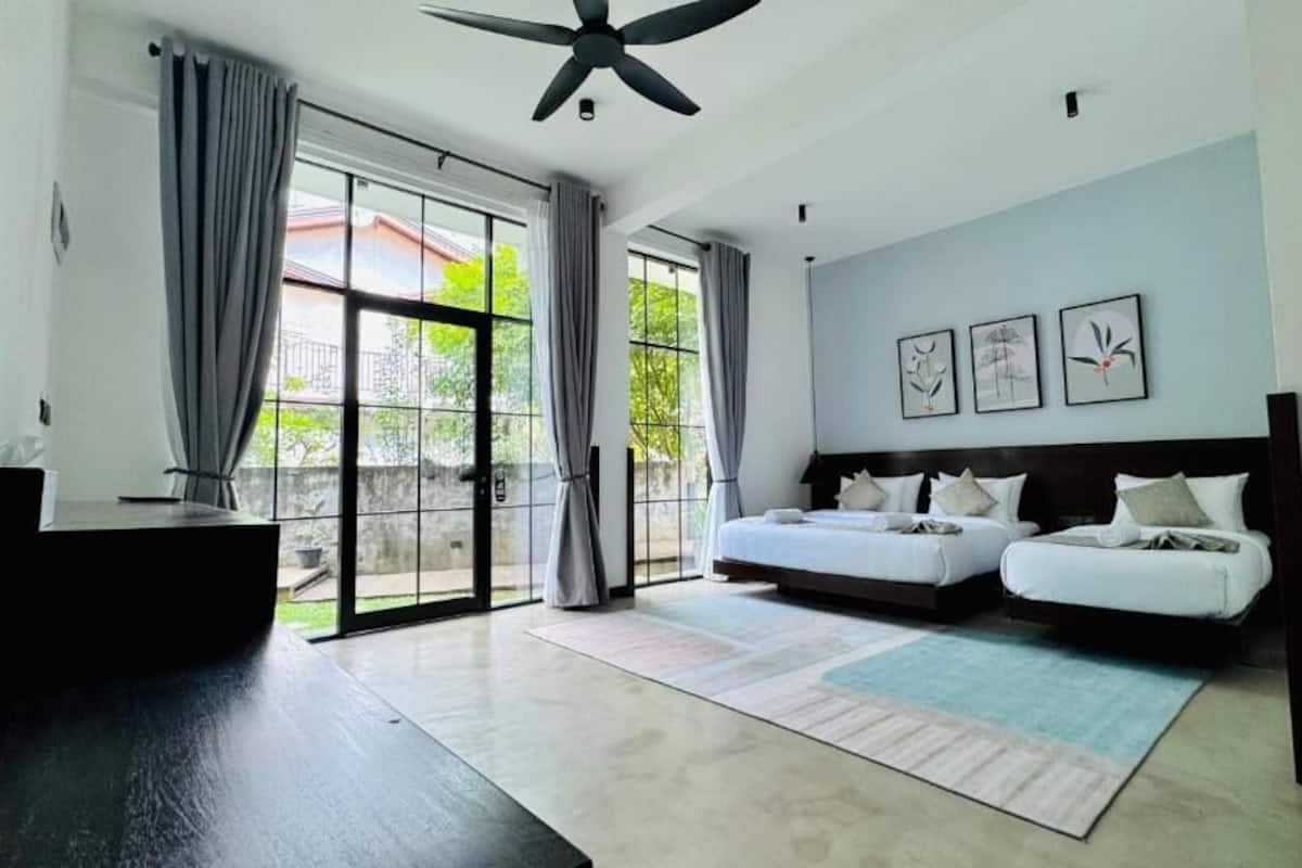 Family Room, Patio, Garden View | In-room safe, blackout drapes, iron/ironing board, WiFi (free)