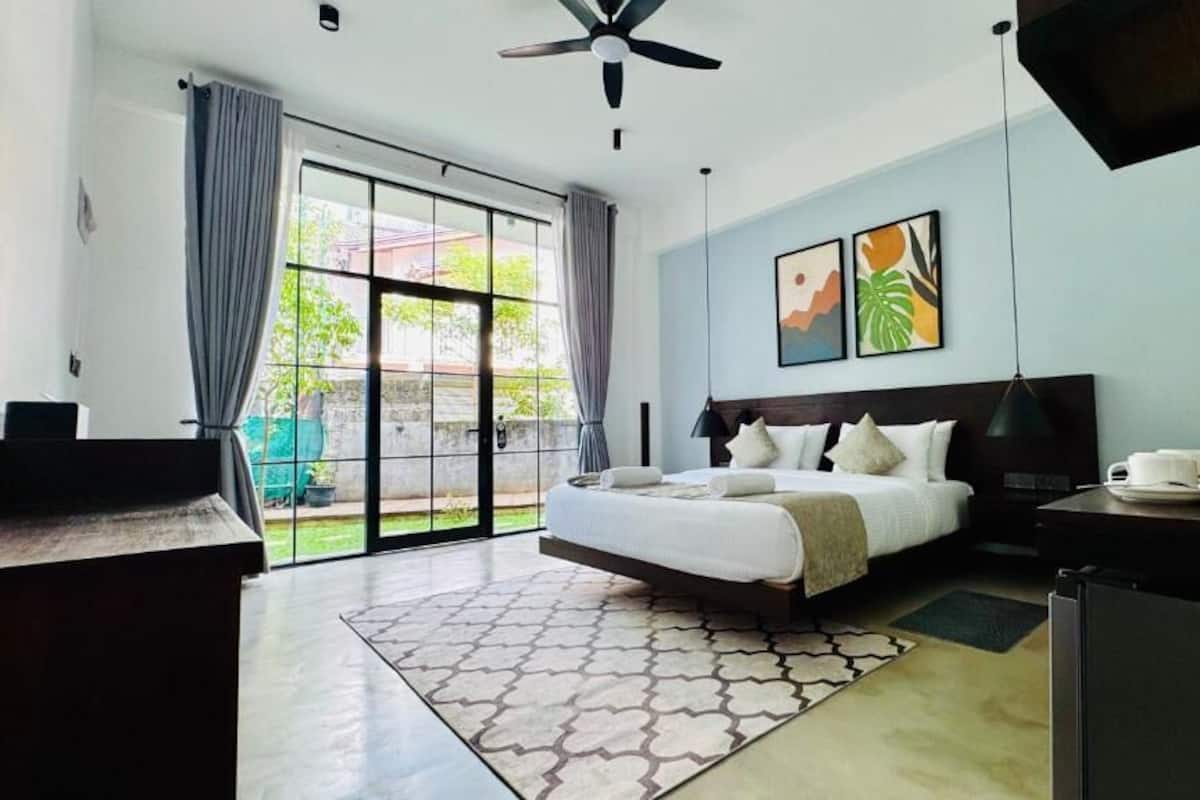 Double Room, Patio, Garden View | In-room safe, blackout drapes, iron/ironing board, WiFi (free)