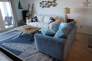 Living area - Cozy 1-bedroom condo with AC in tranquil Panama City Beach, FL (Panama City)