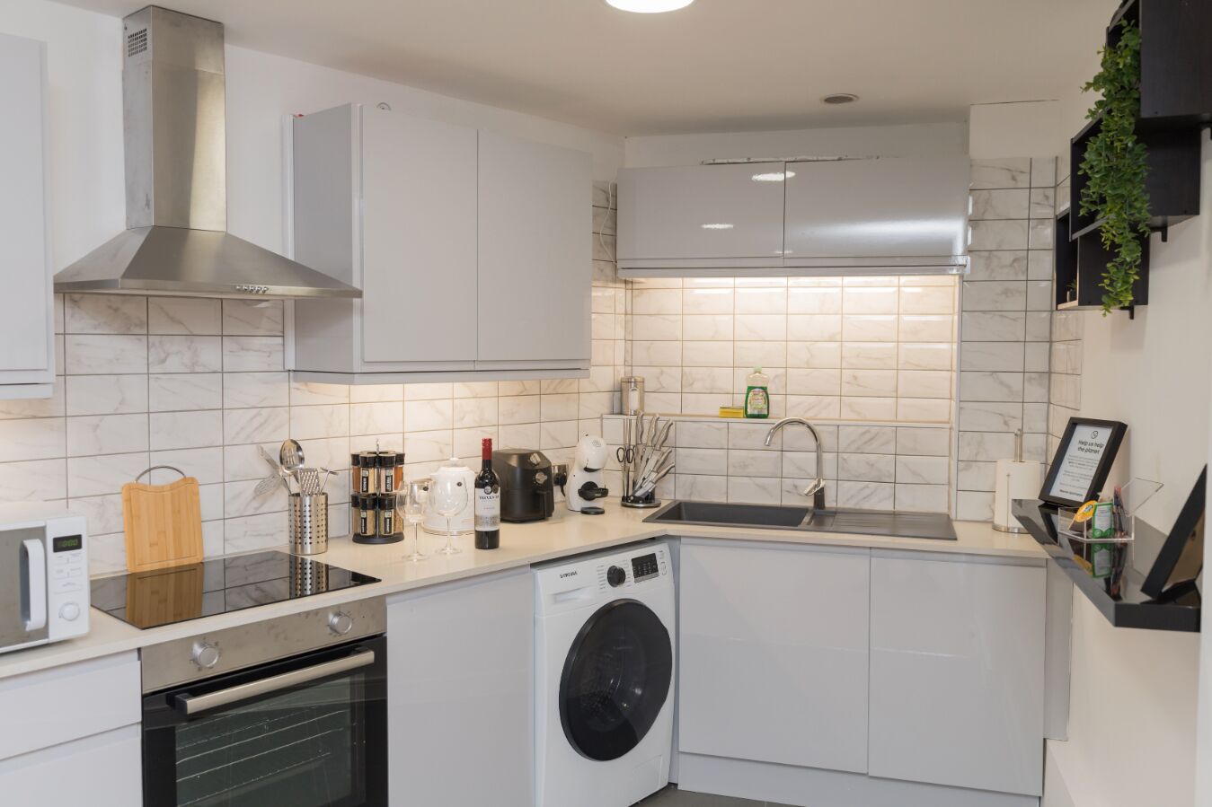 Coffee/tea maker, fridge, microwave, oven