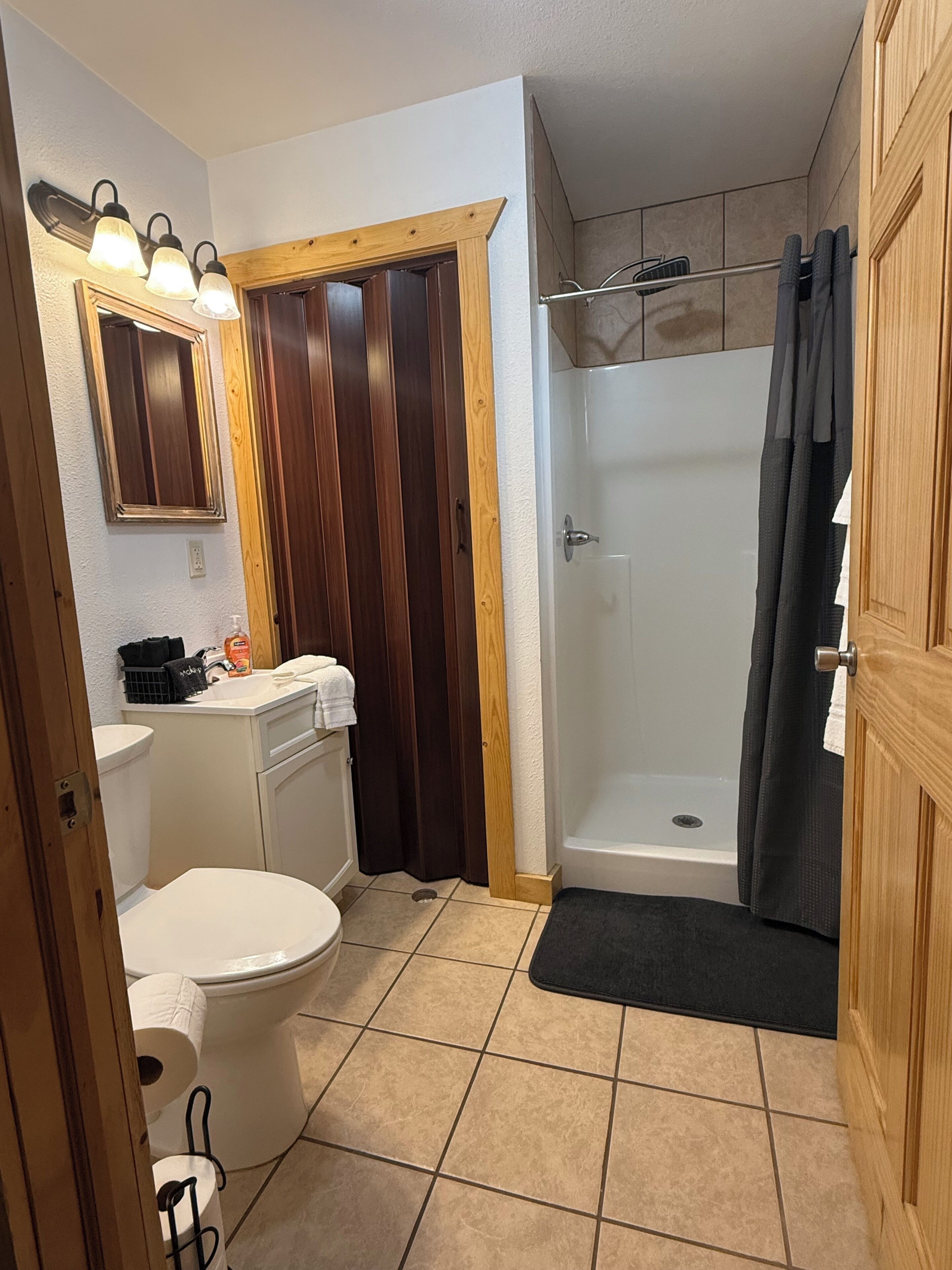 Shower, towels, soap, toilet paper
