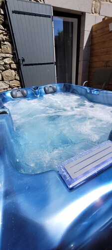 Chambre d'hôtes « Chambre Cézallier » avec terrasse privée et jacuzzi privatif