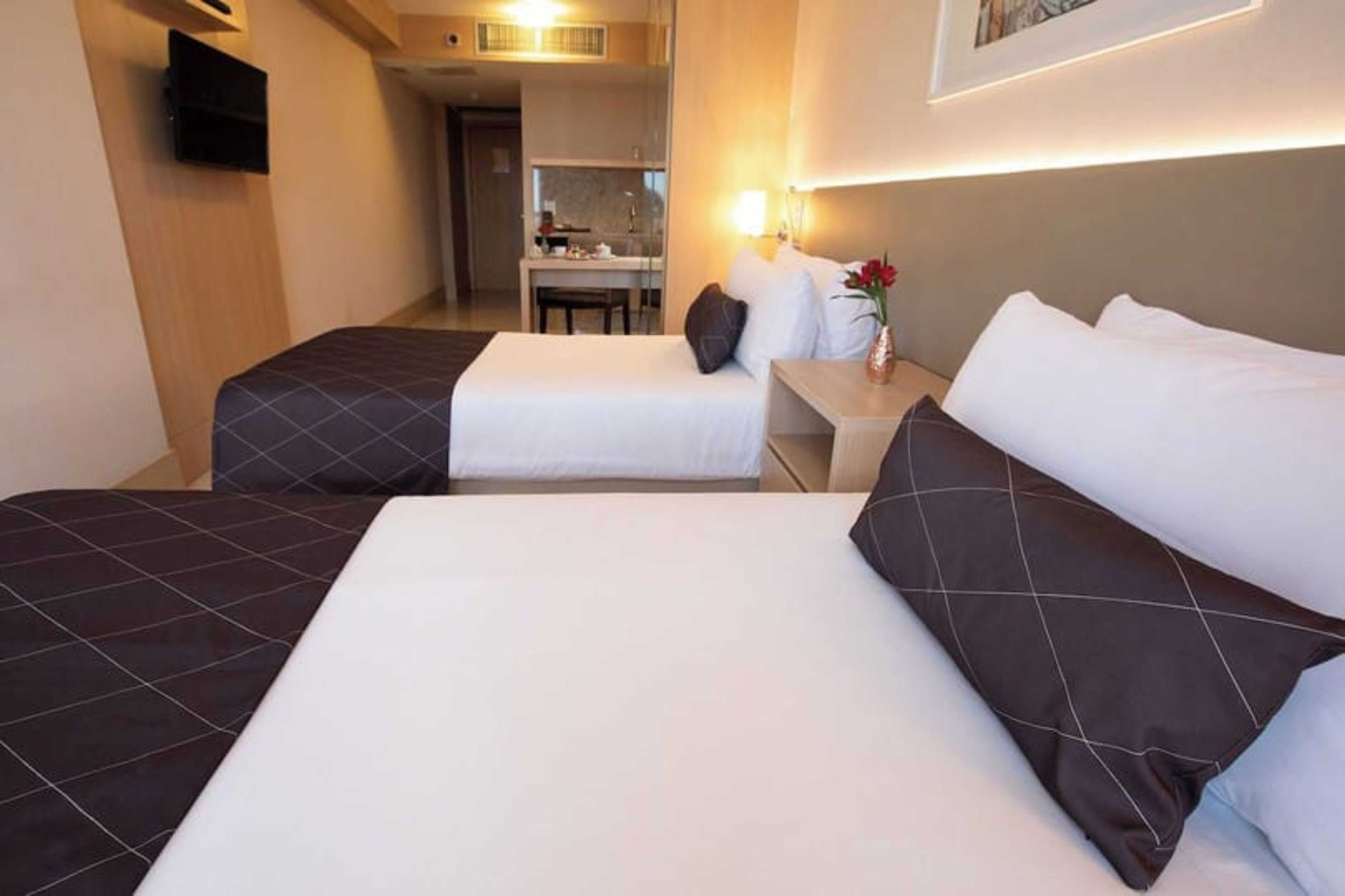 Appartement Deluxe, vue sur la plage | Literie hypoallergénique, coffre-fort, rideaux d’obscurcissement