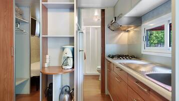 Fridge, stovetop, electric kettle, high chair
