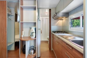 Fridge, stovetop, electric kettle, high chair