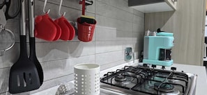 Coffee/tea maker, fridge, microwave, oven