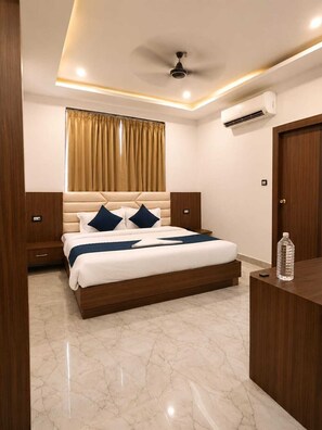 Chambre Deluxe | Coffres-forts dans les chambres, bureau