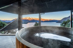 A hot tub with a view of mountains and a lake. - Aspen Ridge by MajorDomo | Fernhill Villa with Lake Views, Infrared Sauna, Spa Pool & Outdoor Fireplace (Queenstown)