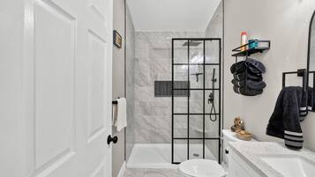 Shower, hair dryer, towels, soap