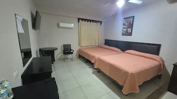 Deluxe Quadruple Room, Balcony, Poolside | Desk, laptop workspace, WiFi (free)