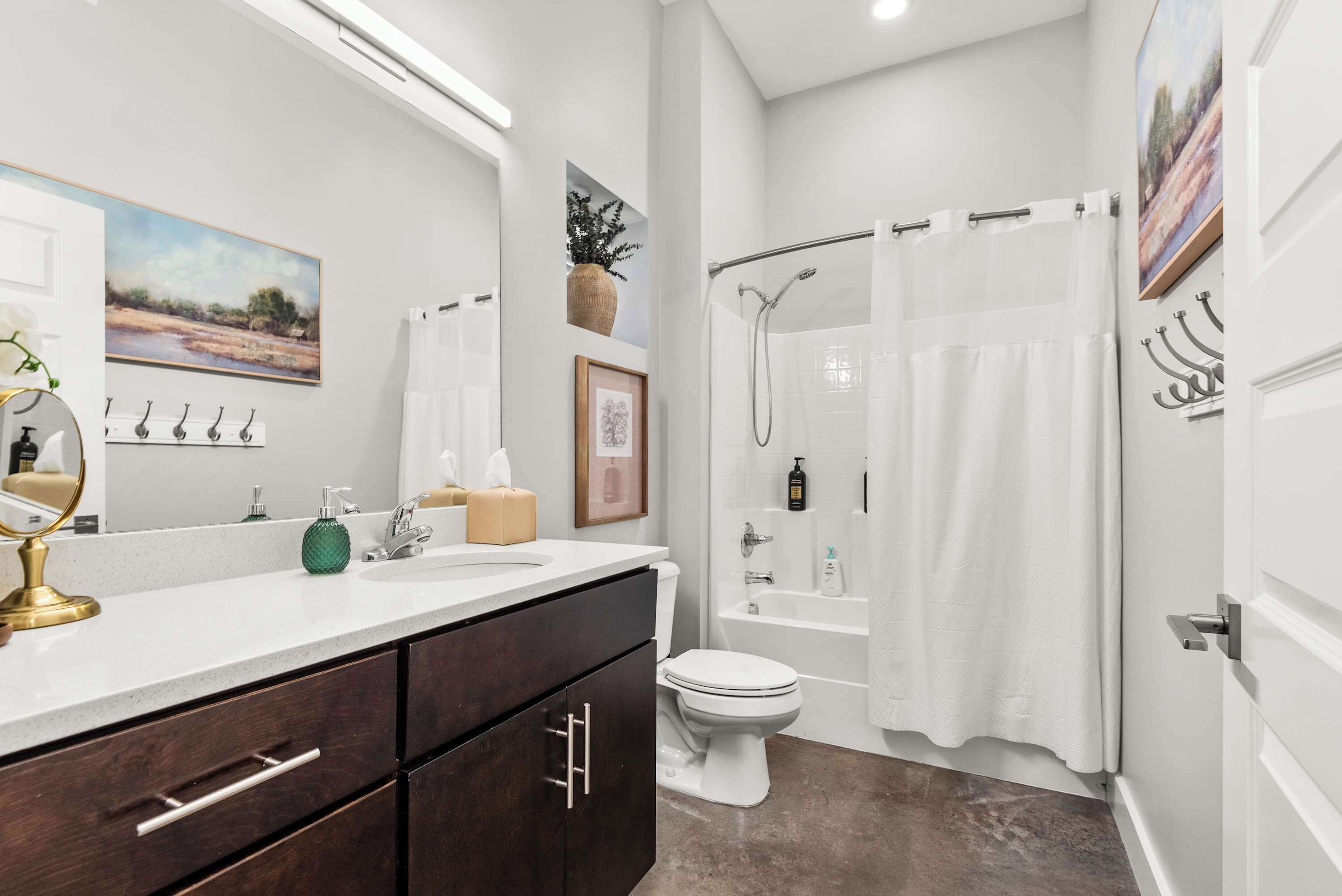 Shower, hair dryer, towels, shampoo