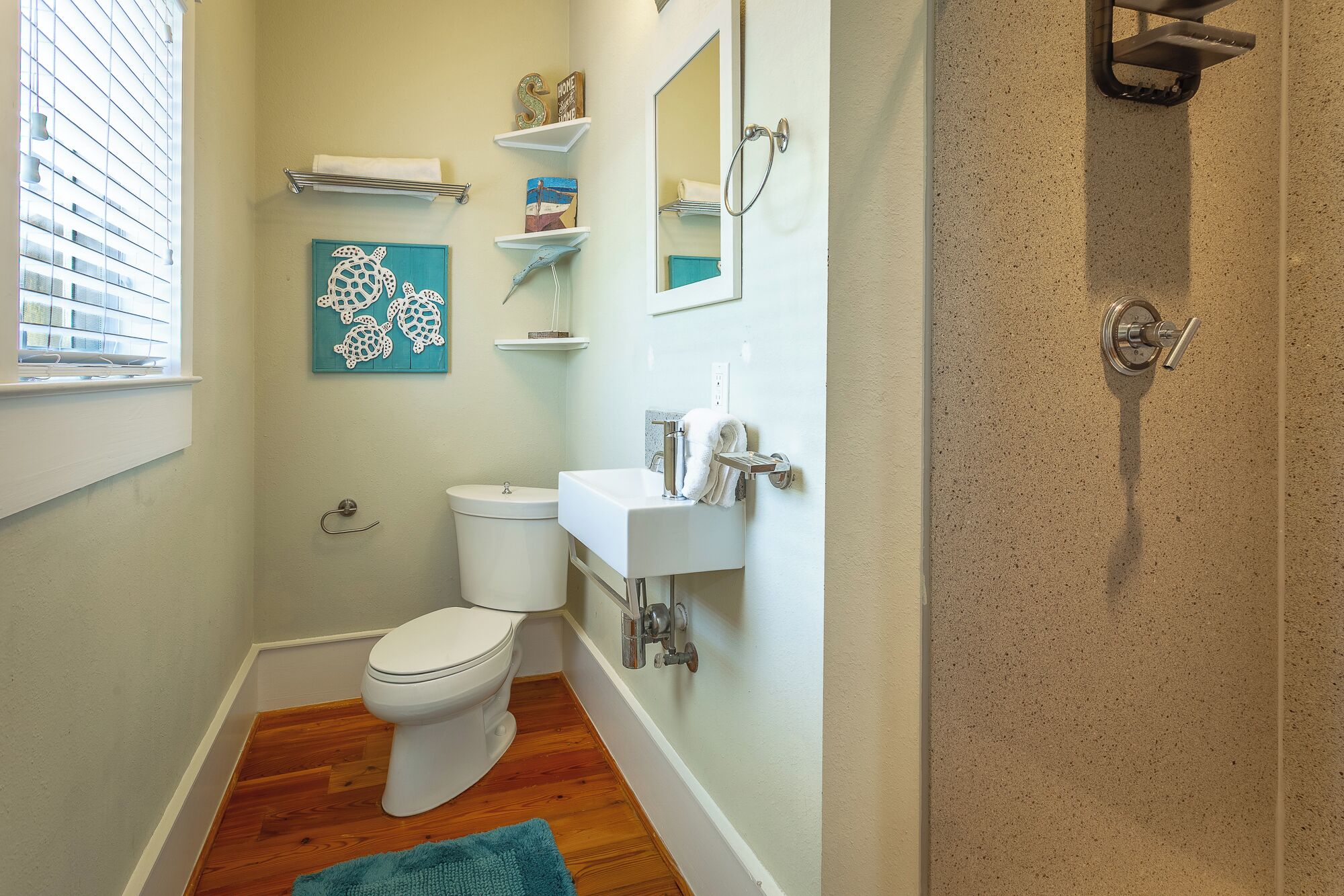 Shower, hair dryer, towels, toilet paper