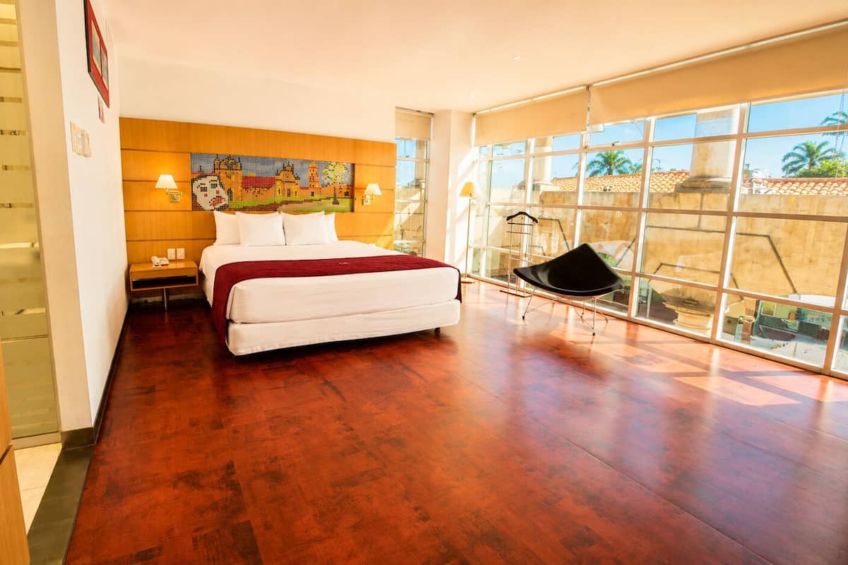Estudio Deluxe, vista a la ciudad | Ropa de cama hipoalergénica, edredón y minibar