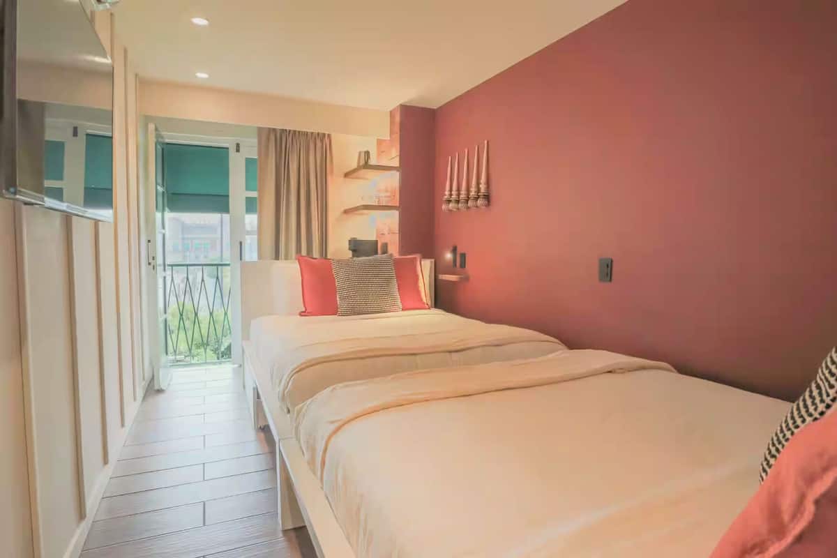 Deluxe Studio Suite, 2 Queen Beds | Minibar, in-room safe, blackout drapes, iron/ironing board