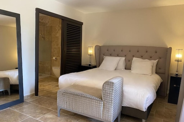 Junior Double Room, Patio, Garden View | In-room safe, desk, iron/ironing board (on request), WiFi (free)