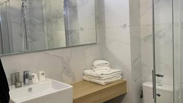 Shower, free toiletries, hair dryer, towels