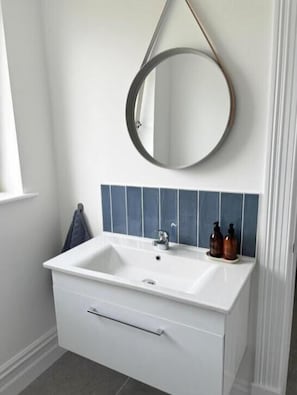 Habitación doble superior | Baño | Regadera 