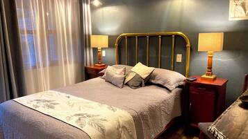 Junior Room | Desk, laptop workspace, blackout curtains, iron/ironing board