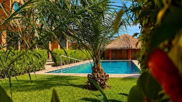 Superior Apartment, Garden View | Pool | Outdoor pool, pool umbrellas, sun loungers
