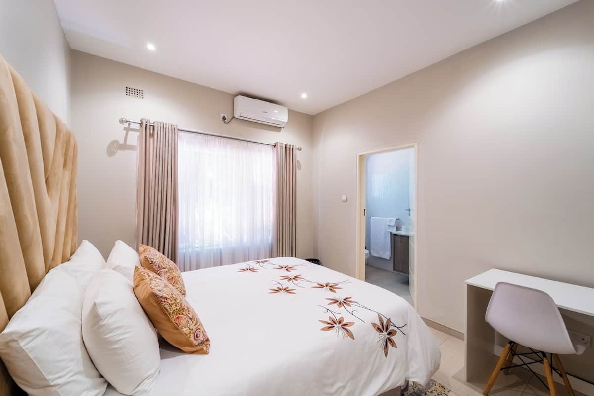 Double Room, Patio, Garden View | Laptop workspace, blackout drapes, soundproofing, iron/ironing board