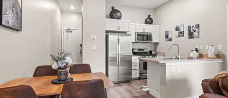 Coffee/tea maker, fridge, microwave, oven