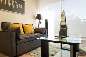 Apartamento familiar, vistas a la ciudad | Zona de estar