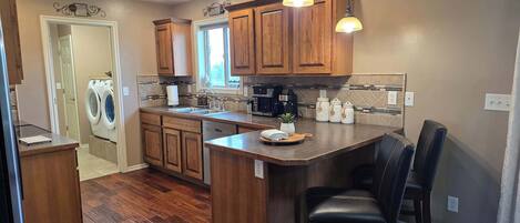 Coffee/tea maker, fridge, microwave, oven