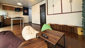 Living area - Downtown Takamatsu: Top floor of a building in the entertainment district where groups can party all night long. 168 square meters, entire building available for private rental. Mahjong, karaoke, darts, rooftop terrace. Accommodates up to 10 people. (高松市)
