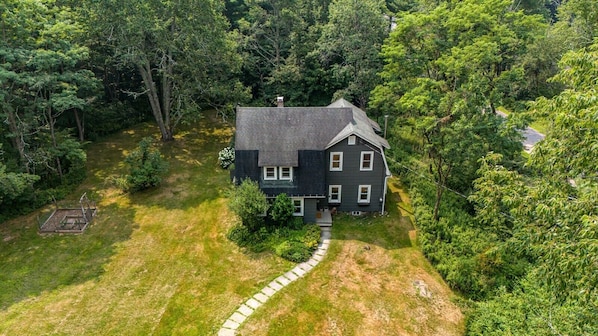Nestled among mature trees, this private escape offers space to relax, reconnect, and unwind