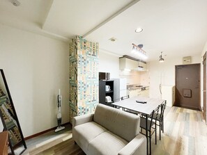 Comfort-Apartment, Balkon | Wohnbereich