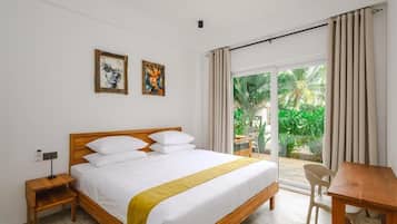 Standard Apartment, Pool View | In-room safe, desk, laptop workspace, iron/ironing board